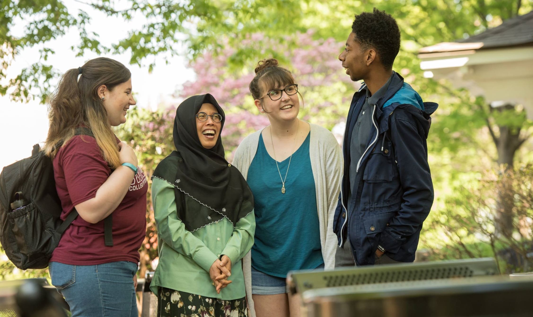 Students talking on campus outside