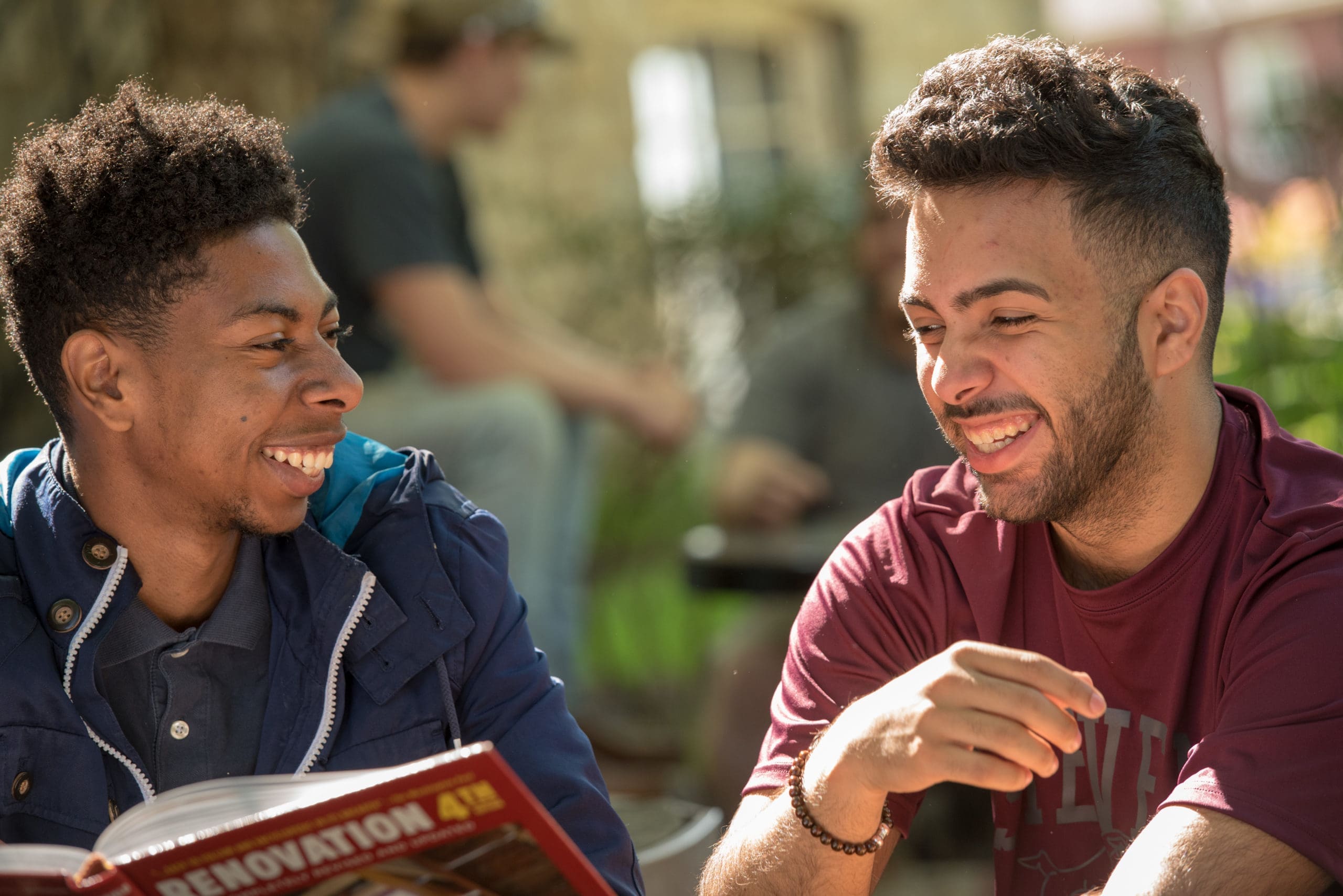 Two students studying on campus.