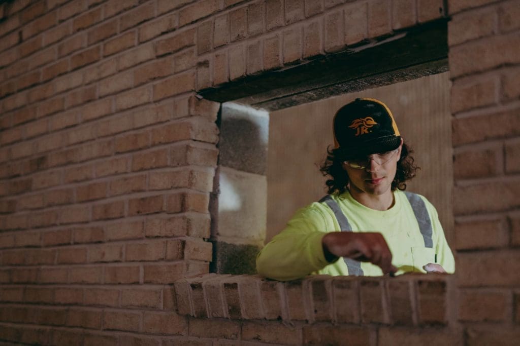 A masonry student hard at work 