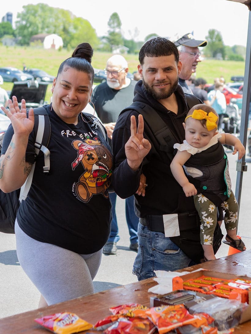 An alumni family at an event. 