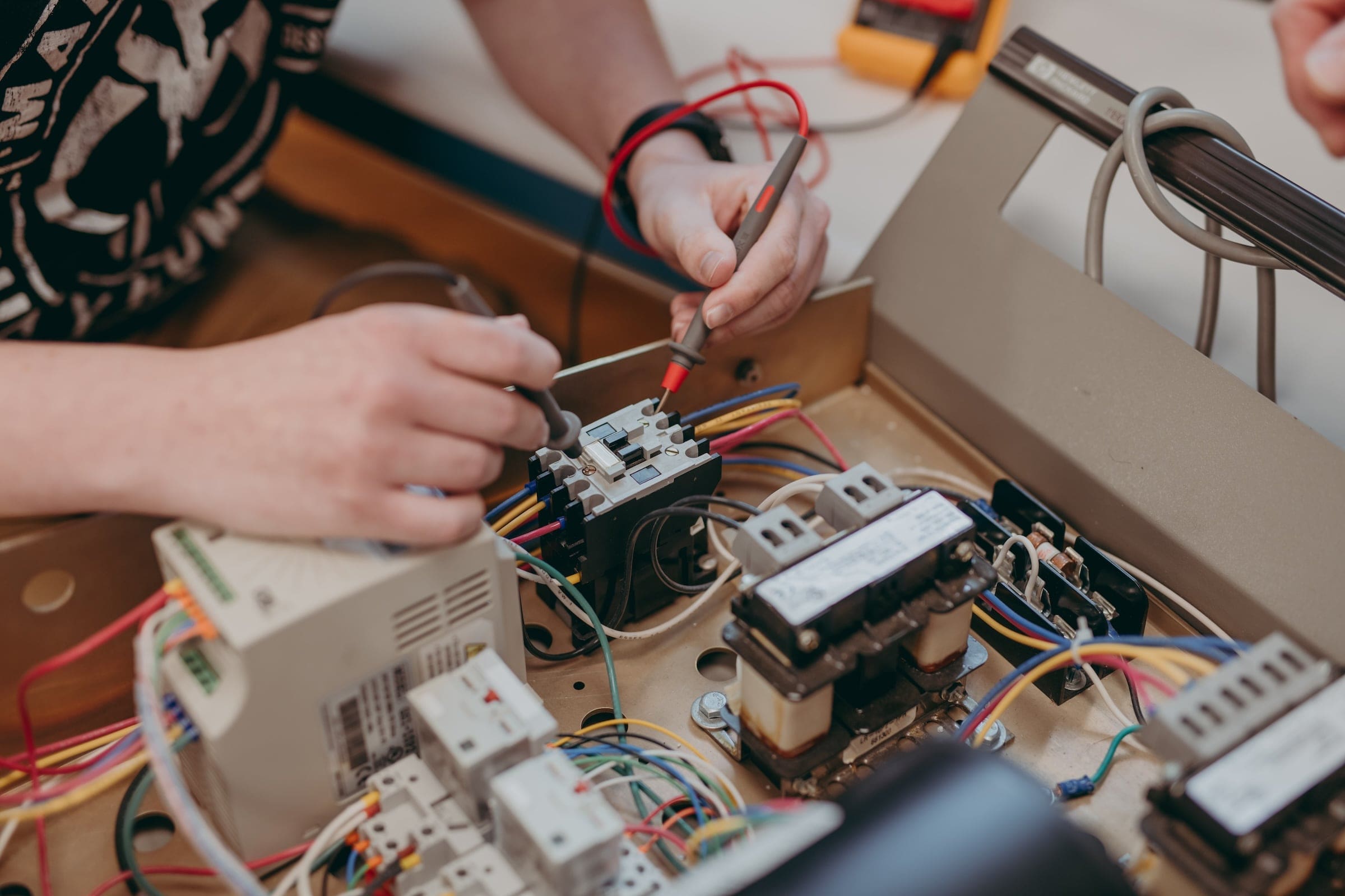 A student works with electronic circuitry in the electronic engineering technology program at Thaddeus Stevens College