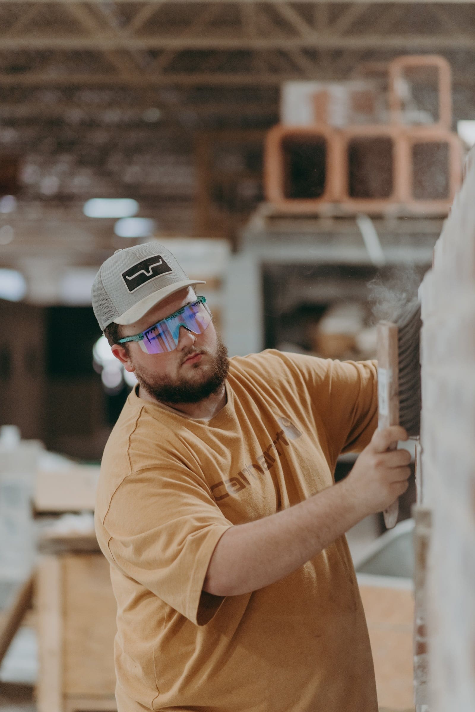 A masonry student completing finish work