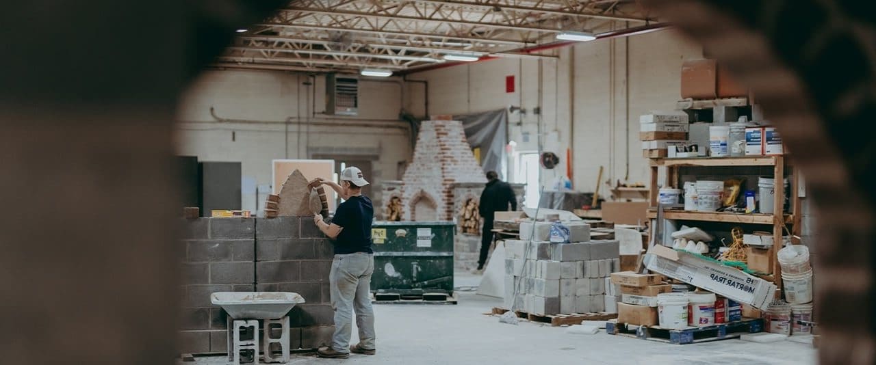 Masonry students working in the lab space on projects. 