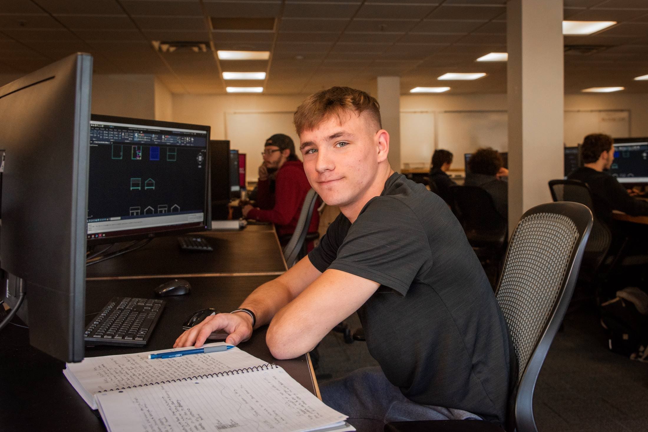 An architectural technology student in class