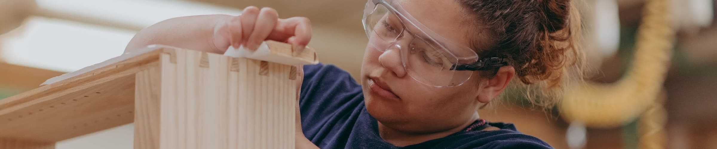 TSCT Cabinetmaking & Wood Technology student finishing her framing of cabinet