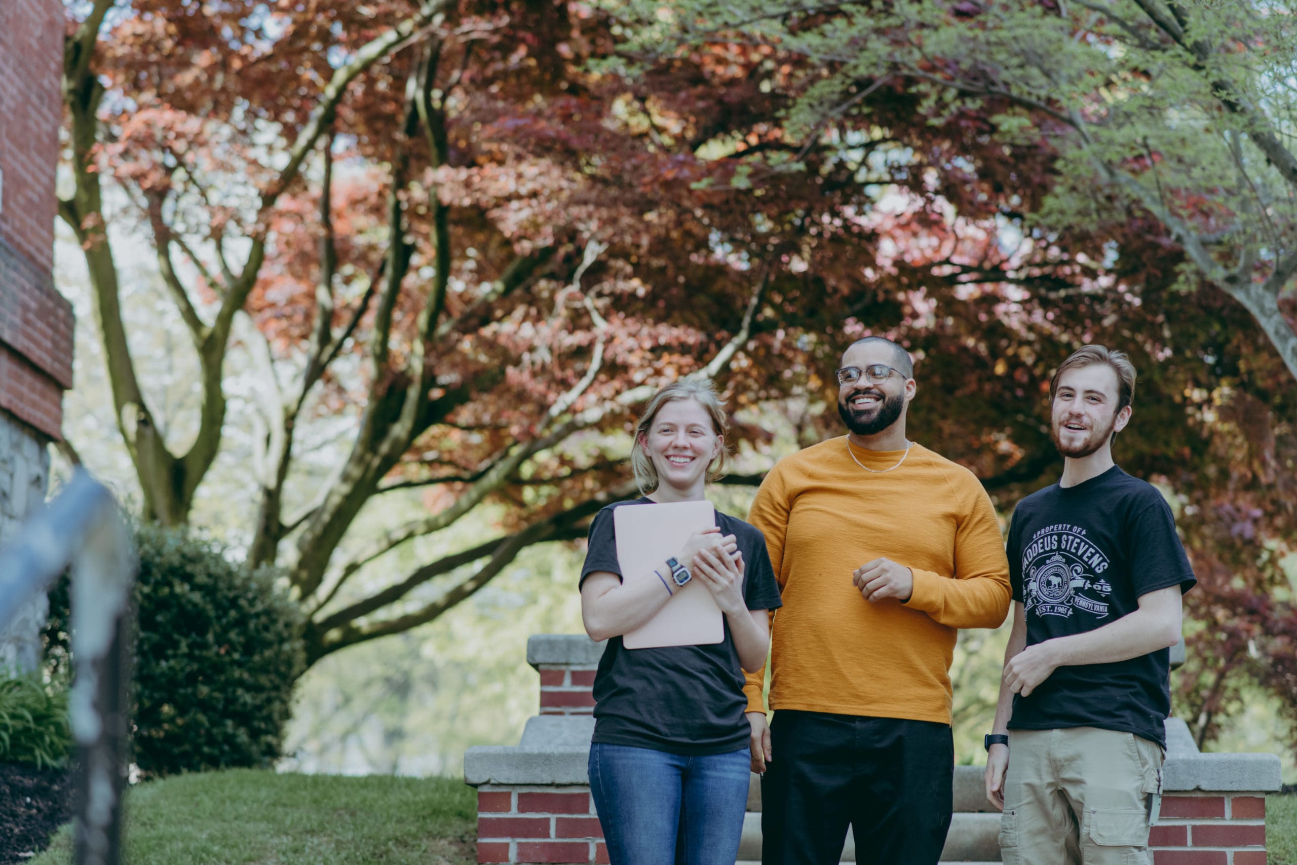 Three students on campus at Thaddeus Stevens College outside. 