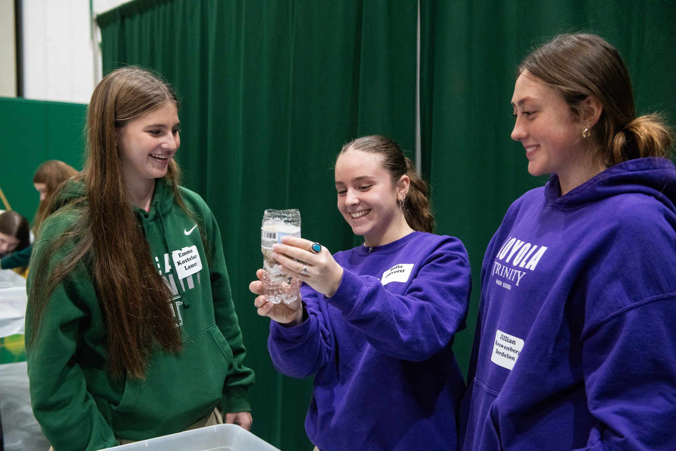 High school students interacting with STEM activities and Thaddeus Stevens College